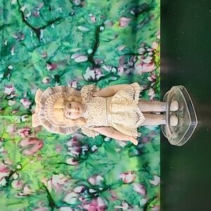 Vintage porcelain doll w/stand